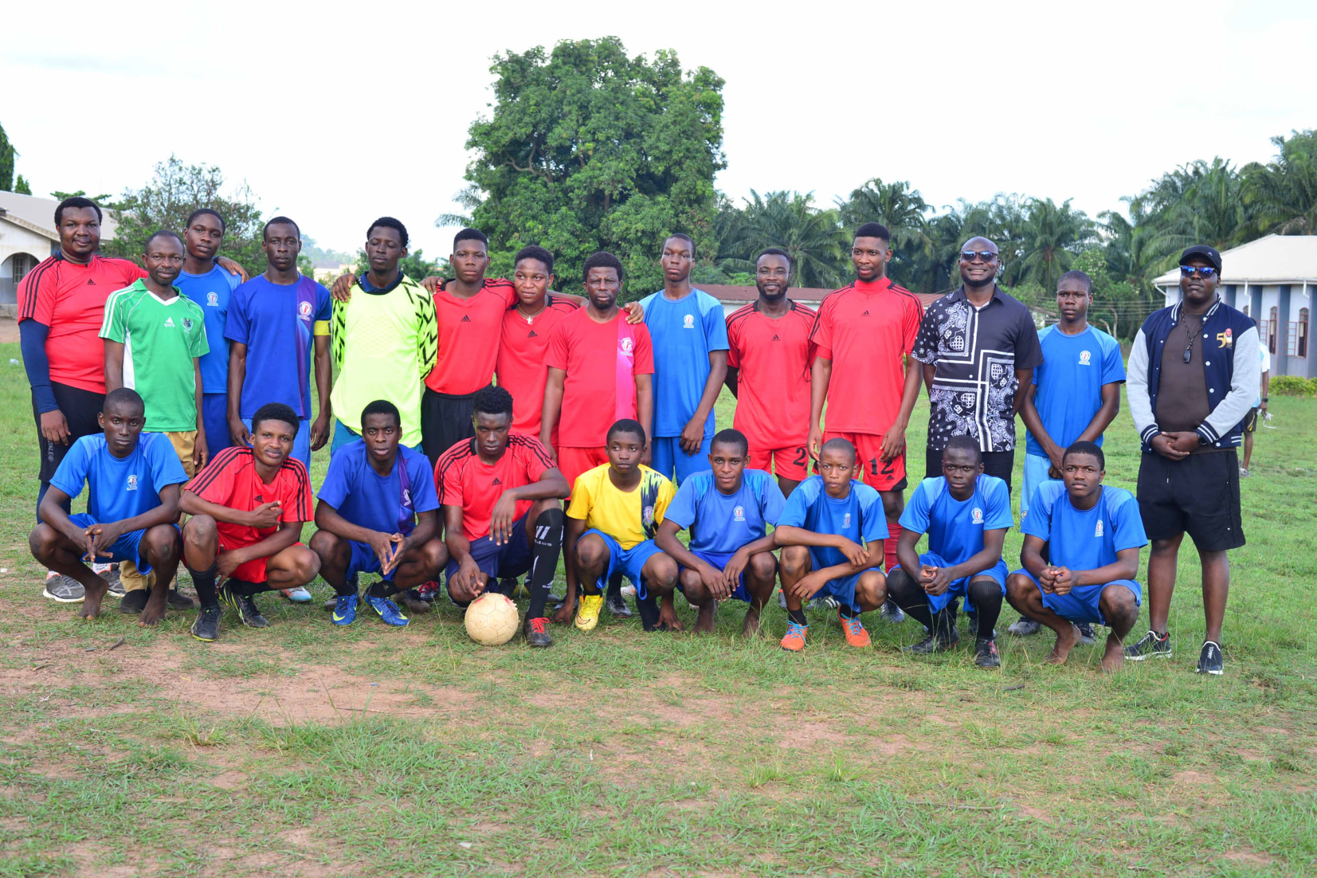 Alumni and current seminarians pose together after the Reunion football match