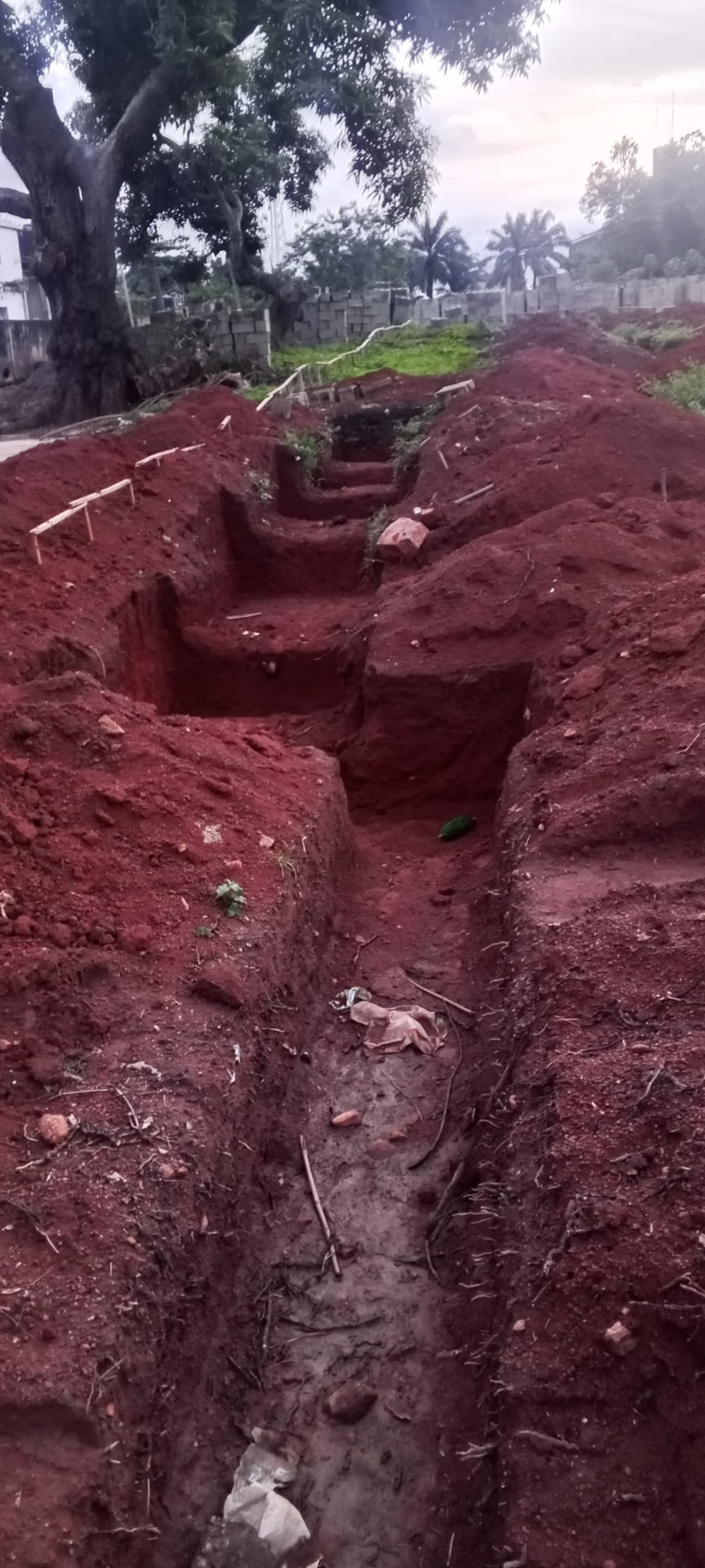 Foundation excavation at the SHSAOBA building site — Stepped trench running the length of the site